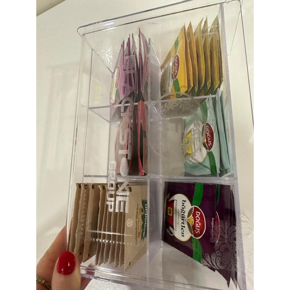 Organizer per scatole da tè in acrilico di lusso: una soluzione di archiviazione multifunzionale con sei scomparti per bustine di tè, caffè, tazza da tè, infusore e coperchio, perfetto per l'uso in casa e in cucina.